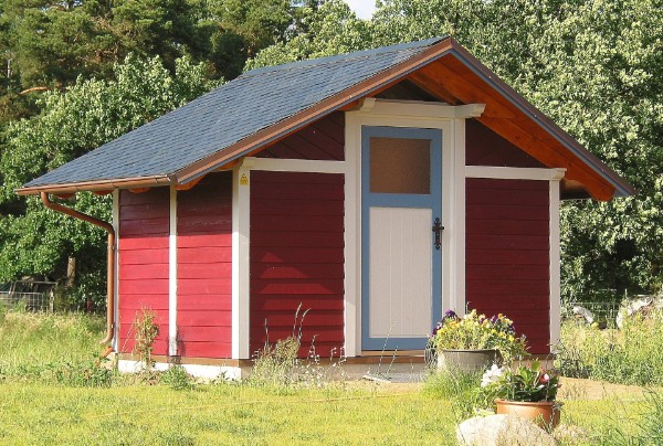 Gartenhaus aus Lärchenholz mit Naturschiefer-Dacheindeckung